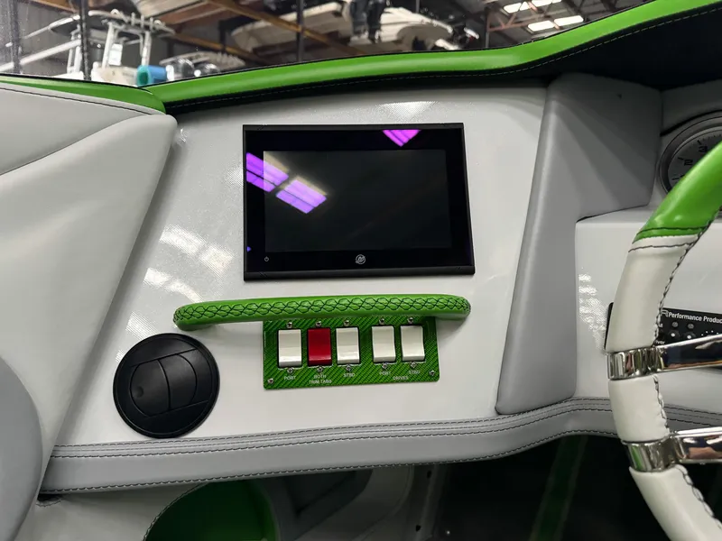 Slide: The Image of Dashboard of 2021 Skater 50 boat with touchscreen and control buttons. - 41