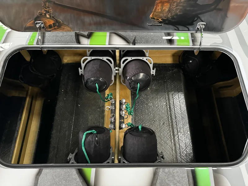 Slide: The Image of Open engine compartment of 2021 Skater 50 boat with visible components. - 43