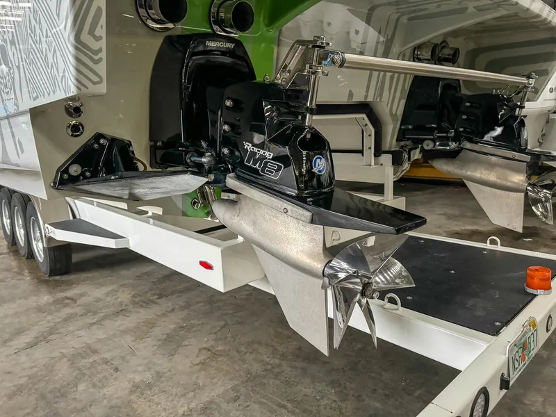 Slide: The Image of Skater 50 boat engine, 2021 model, on a trailer in a garage. - 45