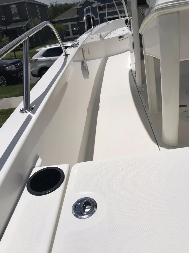 Slide: The Image of 2016 Boston Whaler 270 Dauntless boat deck, sleek design, white finish. - 21