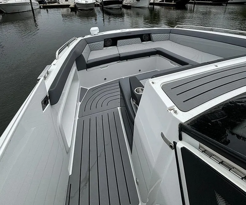 Slide: The Image of 2024 Galeon 325 GTO boat with spacious seating area and modern design. - 12