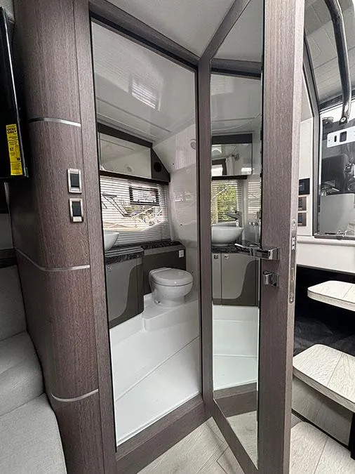 Slide: The Image of 2024 Galeon 325 GTO yacht interior bathroom with modern fixtures and sleek design. - 21