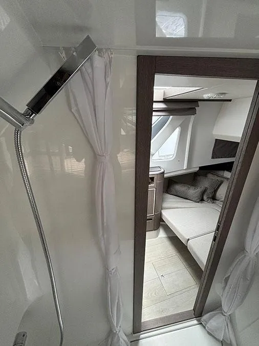 Slide: The Image of Interior of 2024 Galeon 325 GTO yacht showing shower and cozy cabin. - 24