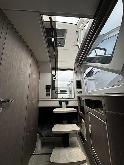 Slide: The Image of Interior of 2024 Galeon 325 GTO yacht with modern design and wooden finishes. - 26