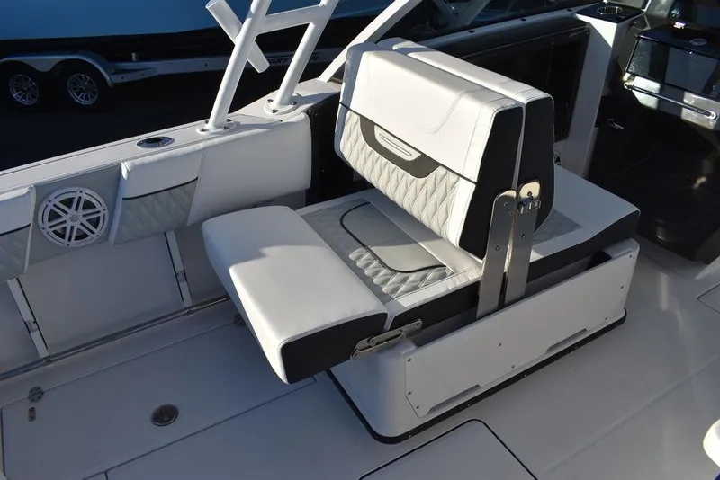 Slide: The Image of 2024 Blackfin 252DC boat interior with stylish seating and modern design. - 29