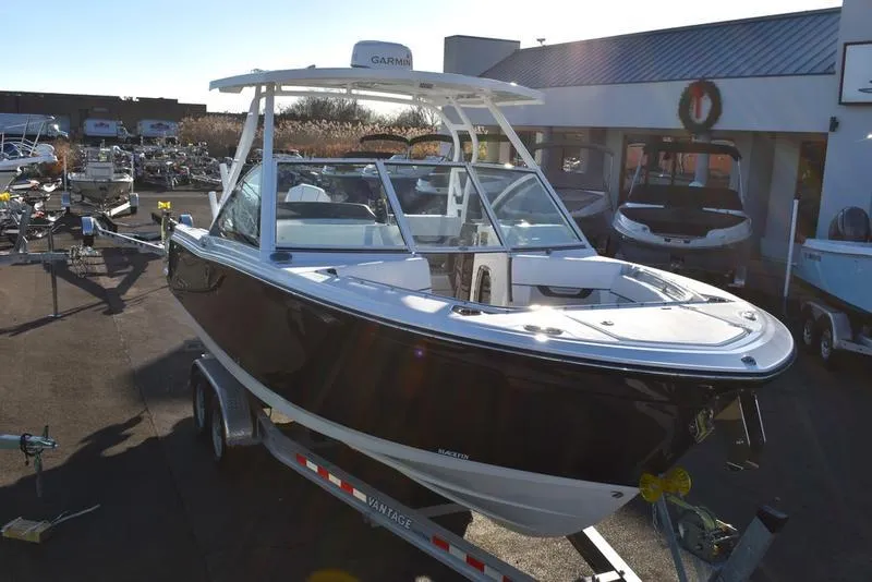 Slide: The Image of 2024 Blackfin 252DC boat on trailer at dealership. - 3