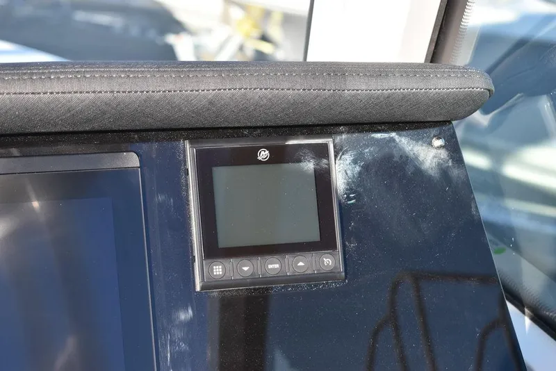 Slide: The Image of 2024 Blackfin 252DC dashboard with digital display and controls. - 45