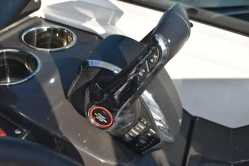 Slide: The Image of Close-up of 2024 Blackfin 252DC boat throttle control. - 47