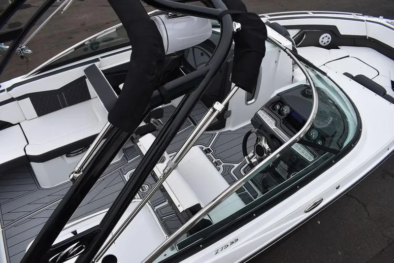 Slide: The Image of 2024 Monterey 275SS boat interior with modern seating and dashboard. - 11