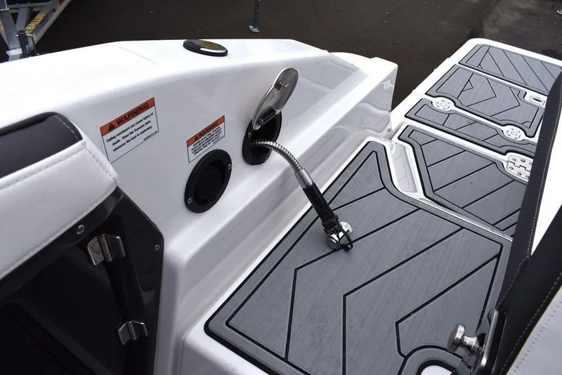 Slide: The Image of 2024 Monterey 275SS boat deck with fuel inlet and non-slip flooring. - 28