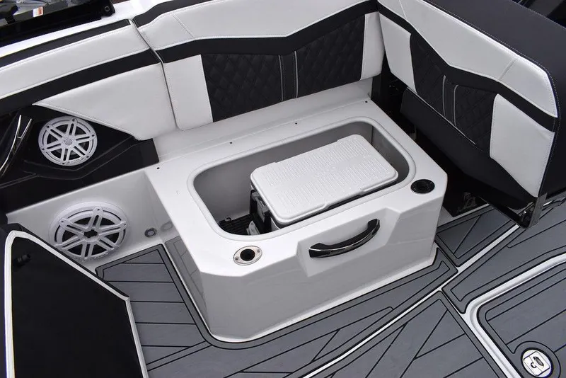 Slide: The Image of 2024 Monterey 275SS boat interior with storage compartment and speakers. - 35