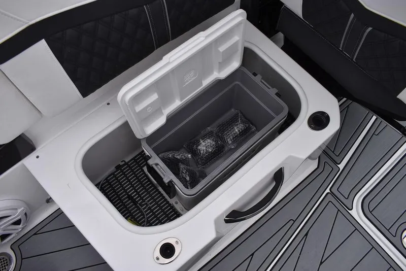 Slide: The Image of 2024 Monterey 275SS boat storage compartment with built-in cooler. - 36