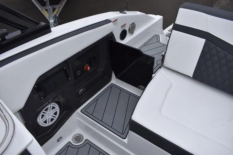 Slide: The Image of 2024 Monterey 275SS boat interior with modern seating and control panel. - 37