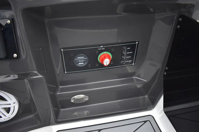 Slide: The Image of 2024 Monterey 275SS boat control panel with switches and gauges. - 38