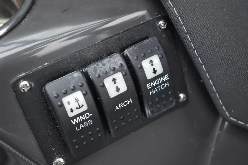 Slide: The Image of Control panel switches on a 2024 Monterey 275SS boat. - 41