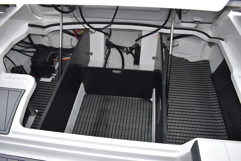 Slide: The Image of Engine compartment of a 2024 Monterey 275SS boat with organized wiring and components. - 43