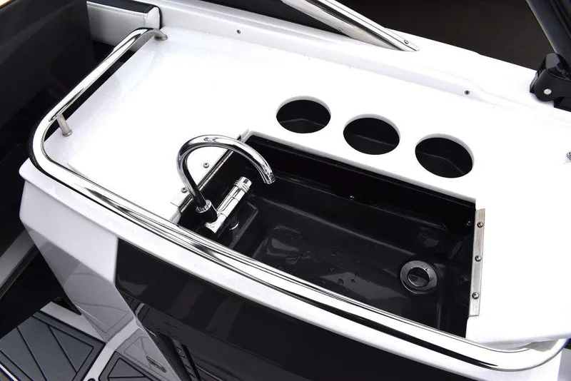 Slide: The Image of 2024 Monterey 275SS boat sink and cup holders. - 46