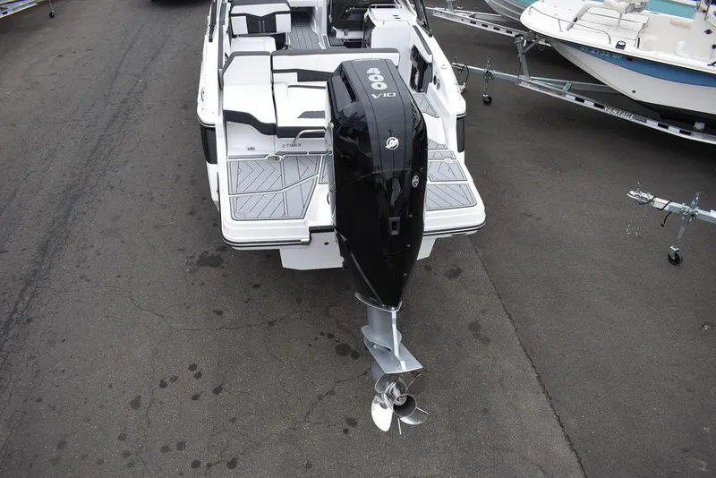 Slide: The Image of 2024 Monterey 275SS boat with powerful outboard motor, rear view. - 5