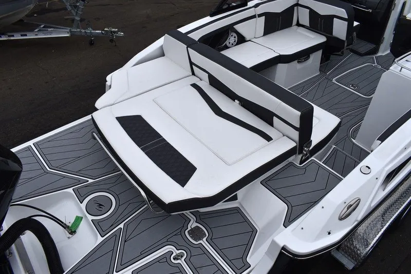 Slide: The Image of 2024 Monterey 275SS boat interior with modern seating and sleek design. - 8