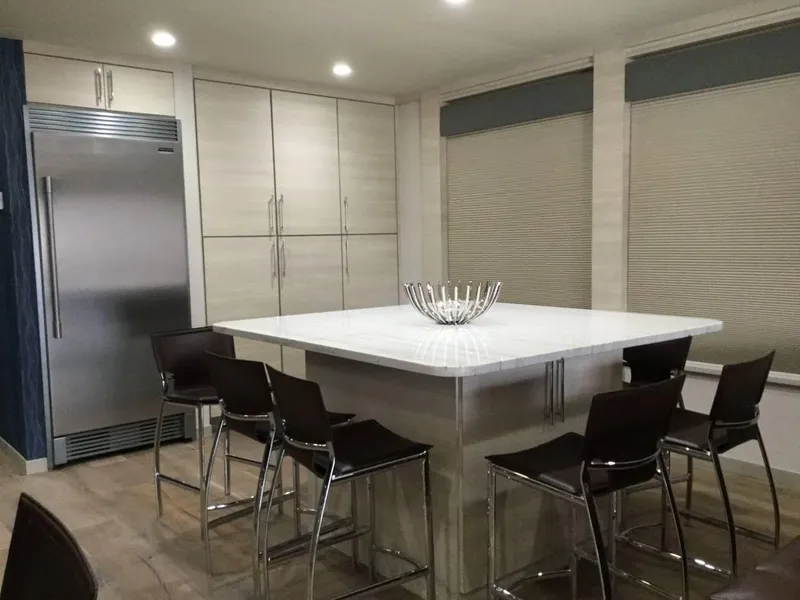 Slide: The Image of Modern kitchen interior with sleek design, featuring stainless steel appliances and elegant lighting. - 10