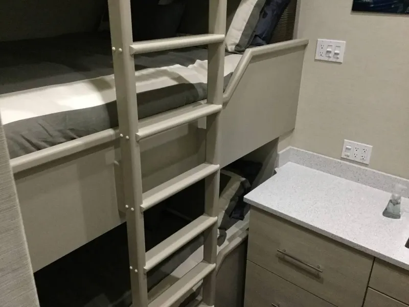 Slide: The Image of Compact cabin interior with bunk beds, sink, and mirror on Adonia Azul Trip #1, 2017. - 16