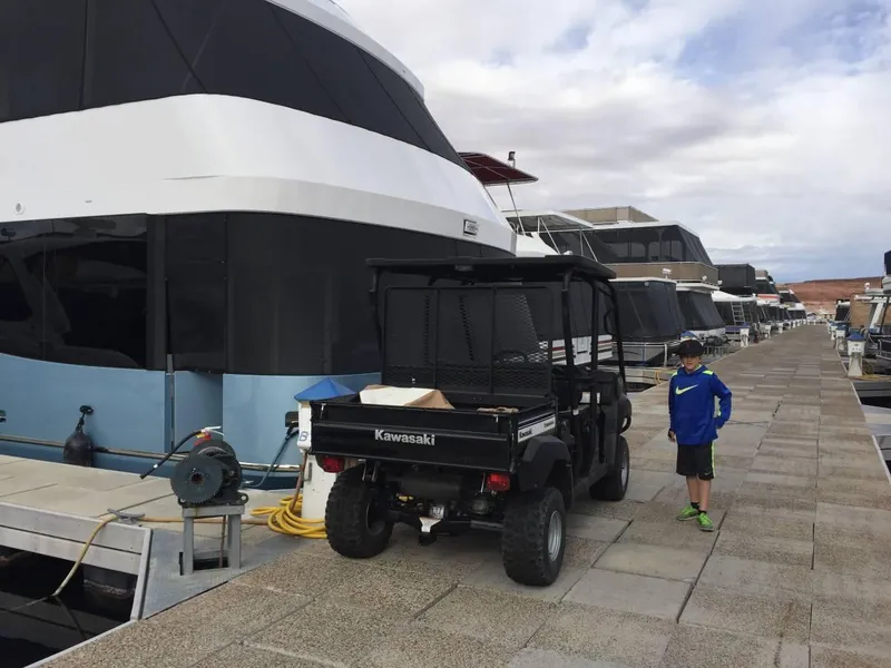 Slide: The Image of Luxury yacht "Adonia Azul" on serene water, accompanied by a speedboat, 2017. - 2