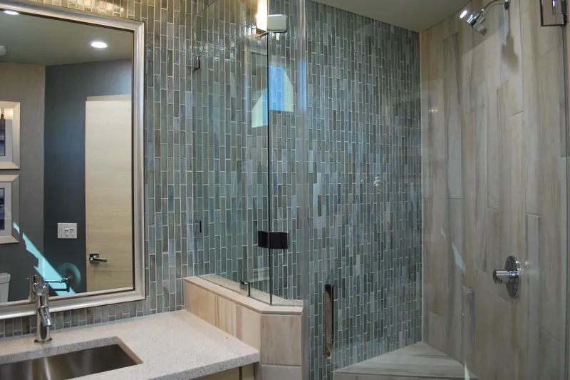 Slide: The Image of Modern bathroom with glass shower, tiled walls, and sleek fixtures, Adonia Azul Trip 2017. - 23