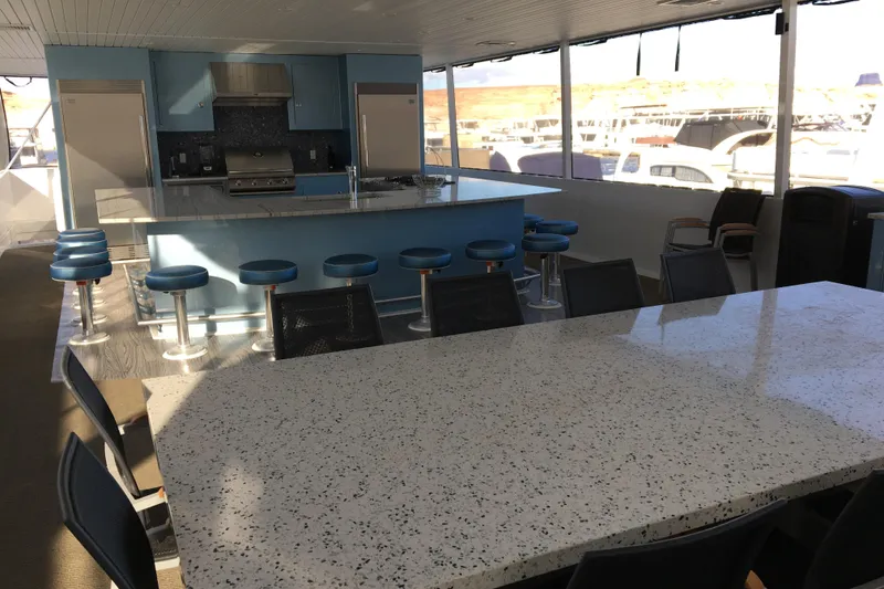 Slide: The Image of Luxurious yacht interior with modern kitchen and bar stools, Adonia Azul Trip 2017. - 29