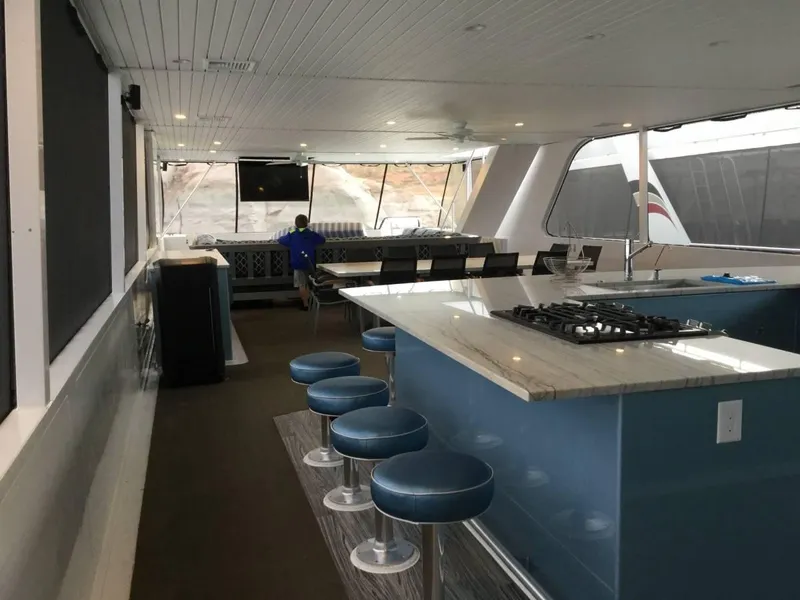 Slide: The Image of Spacious yacht interior with modern kitchen and seating, Adonia Azul Trip 2017. - 6