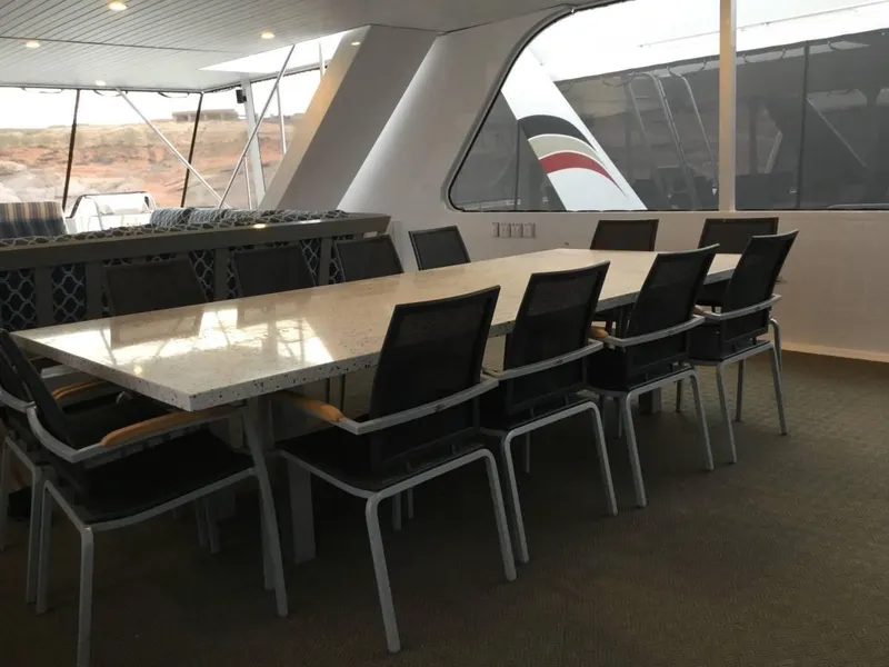 Slide: The Image of Modern kitchen interior with sleek cabinetry, island seating, and stainless steel appliances, Adonia Azul Trip 2017. - 8