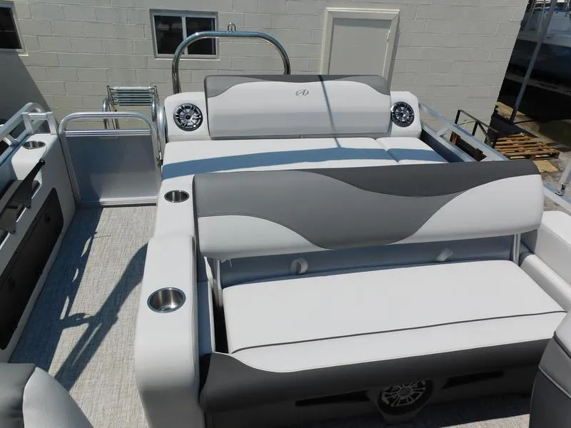 Slide: The Image of 2023 Avalon 2385 LSZ VRL boat interior with stylish seating and cup holders. - 4