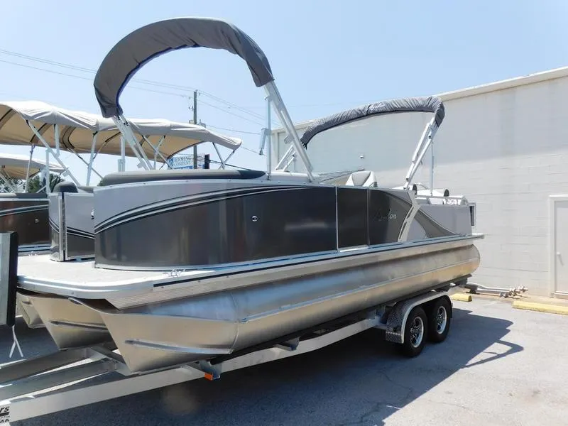 Slide: The Image of 2023 Avalon 2385 LSZ VRL pontoon boat on trailer, featuring sleek design and canopy. - 8