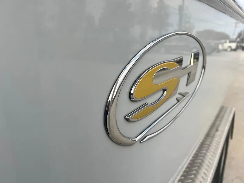 Slide: The Image of 2022 Sea Hunt BX 25 BR boat logo on side panel. - 3