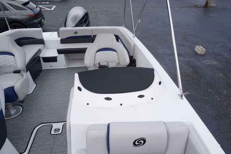 Slide: The Image of 2024 Hurricane 218 SS boat interior with seating and steering console. - 14