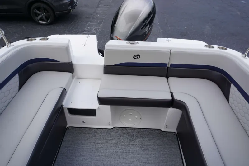 Slide: The Image of Interior seating of 2024 Hurricane 218 SS boat with gray and white upholstery. - 22