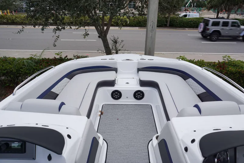 Slide: The Image of 2024 Hurricane 218 SS boat interior with seating and speakers. - 6