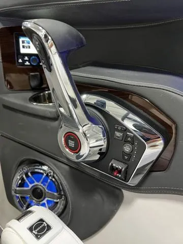 Slide: The Image of 2024 Chaparral 287 SSX boat throttle control and dashboard. - 27