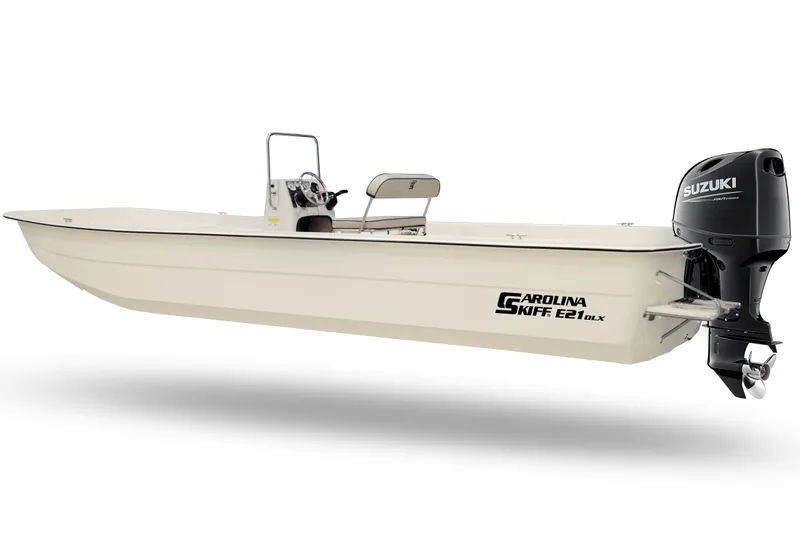 Slide: The Image of 2026 Carolina Skiff E21 DLX CC boat with Suzuki outboard motor, side view. - 7