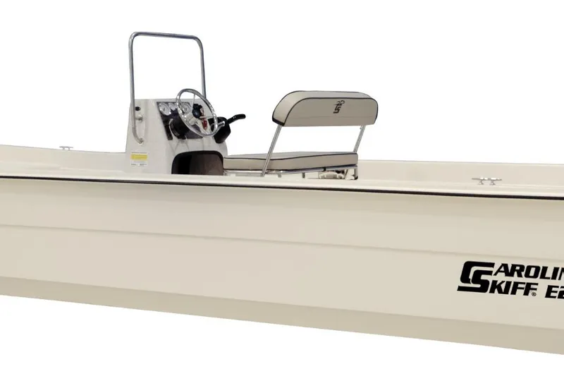 Slide: The Image of 2026 Carolina Skiff E21 DLX CC boat, featuring console and seating. - 9