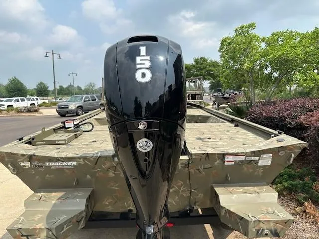 Slide: The Image of 2024 Tracker Grizzly 2072 CC Sportsman boat with 150 HP engine. - 2