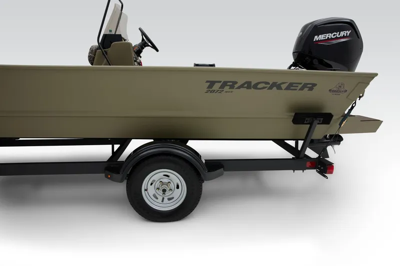 Slide: The Image of 2024 Tracker Grizzly 2072 CC boat on trailer with Mercury outboard motor. - 24