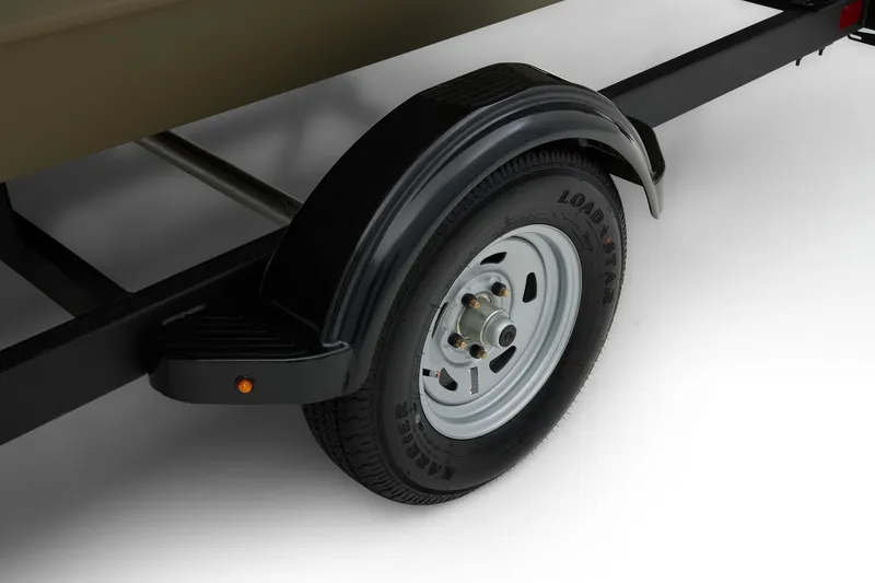 Slide: The Image of Trailer wheel of 2024 Tracker Grizzly 2072 CC boat, featuring Loadstar tire. - 51