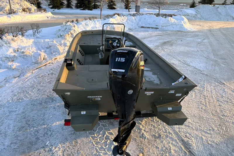 Slide: The Image of 2024 Tracker Grizzly 2072 CC boat parked in snow. - 7