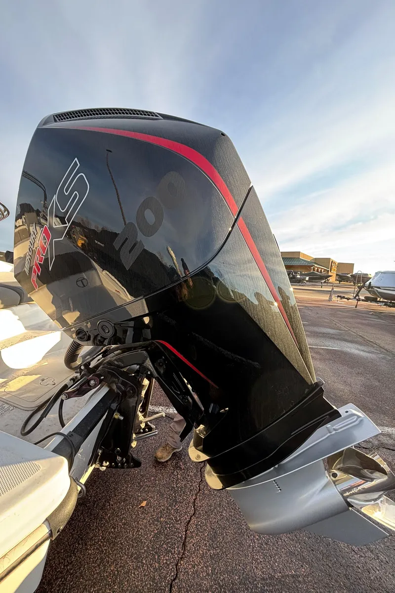 Slide: The Image of 2024 Tahoe T21 outboard motor with sleek black and red design. - 7