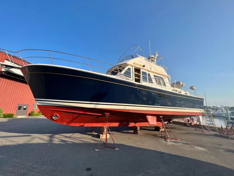 Slide: The Image of 2001 Sabre Sabreline 47 yacht on dry dock for maintenance. - 31