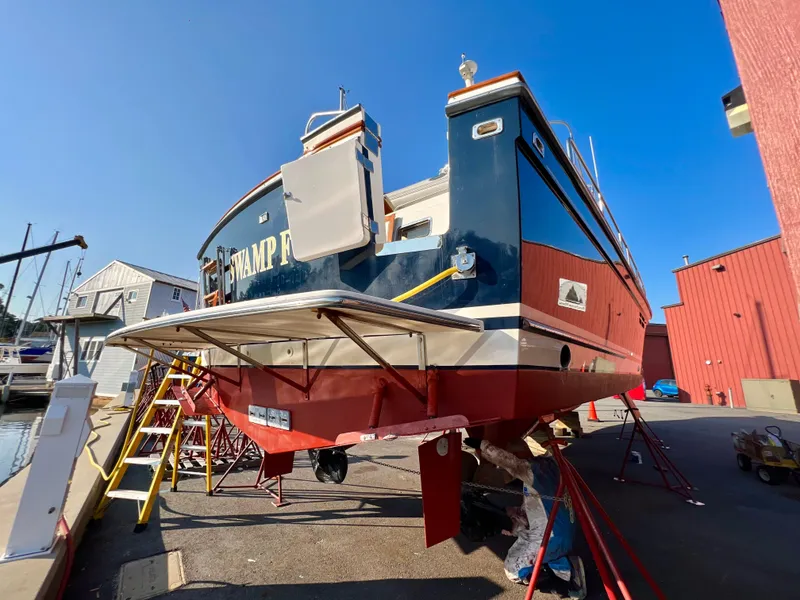 Slide: The Image of 2001 Sabre Sabreline 47 yacht in dry dock for maintenance. - 32
