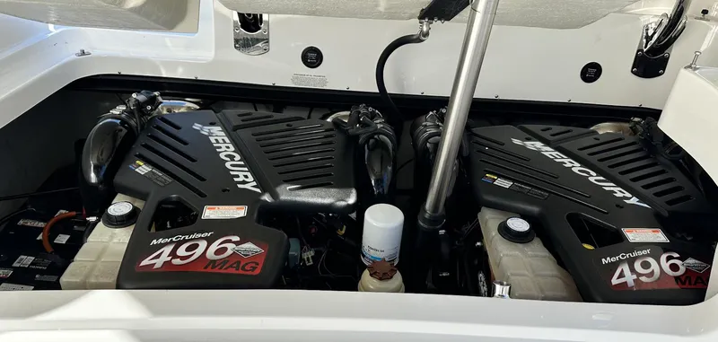 Slide: The Image of Twin MerCruiser 496 MAG engines in a 2006 Cobalt 323 boat. - 15