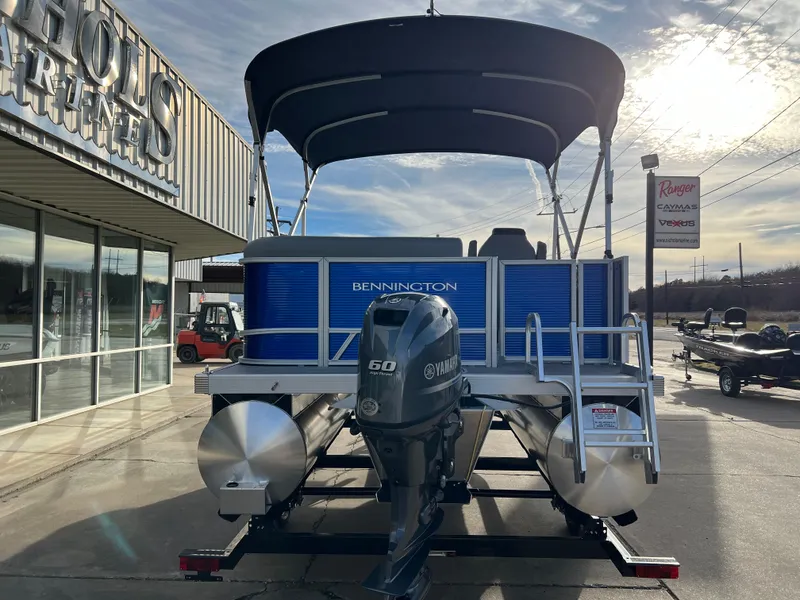 Slide: The Image of 2024 Bennington 188 SVL pontoon boat with Yamaha 60 engine at dealership. - 3