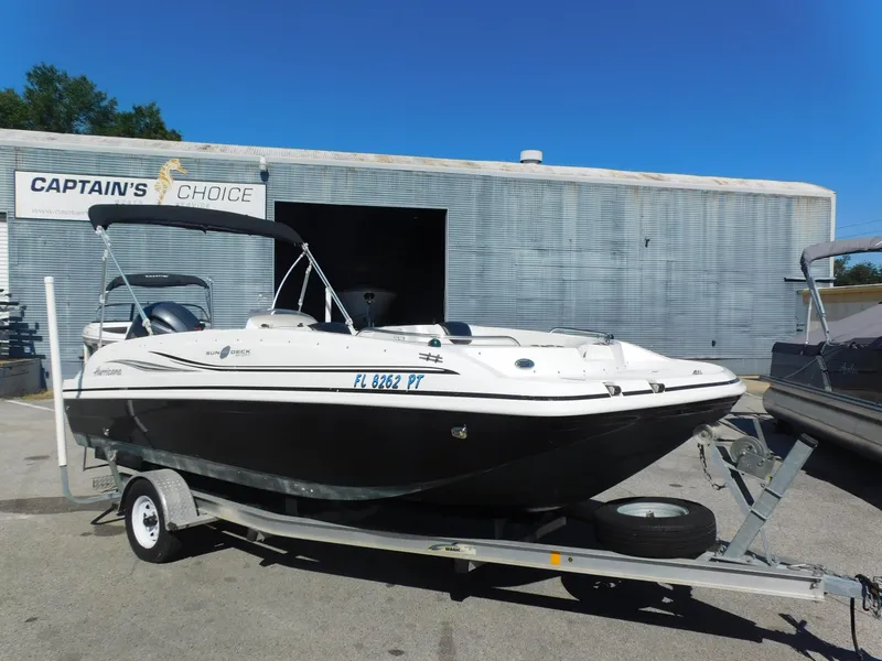Slide: The Image of 2014 Hurricane Sport 188 boat on trailer outside Captain's Choice building. - 1