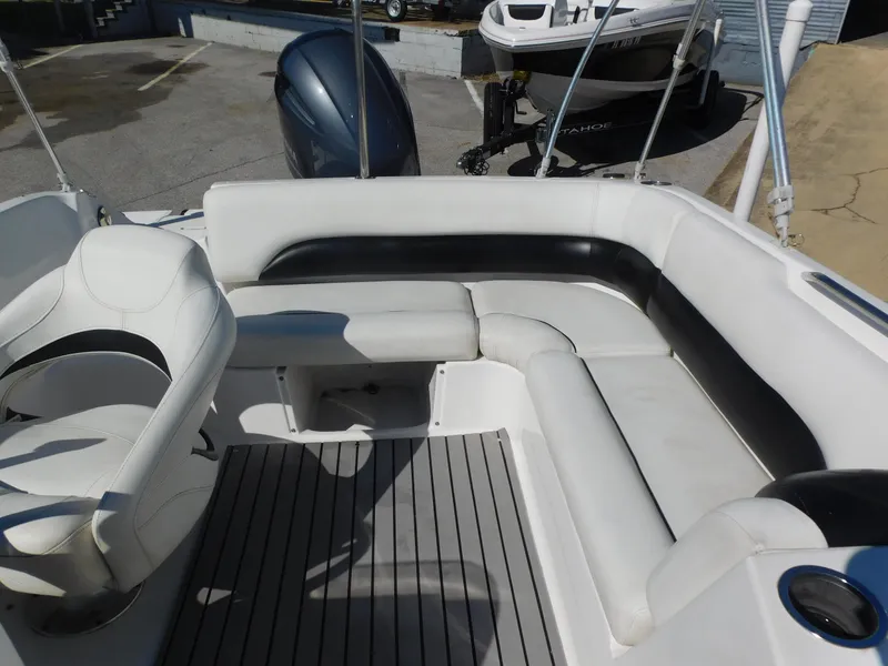 Slide: The Image of 2014 Hurricane Sport 188 boat interior with white and black seating. - 13